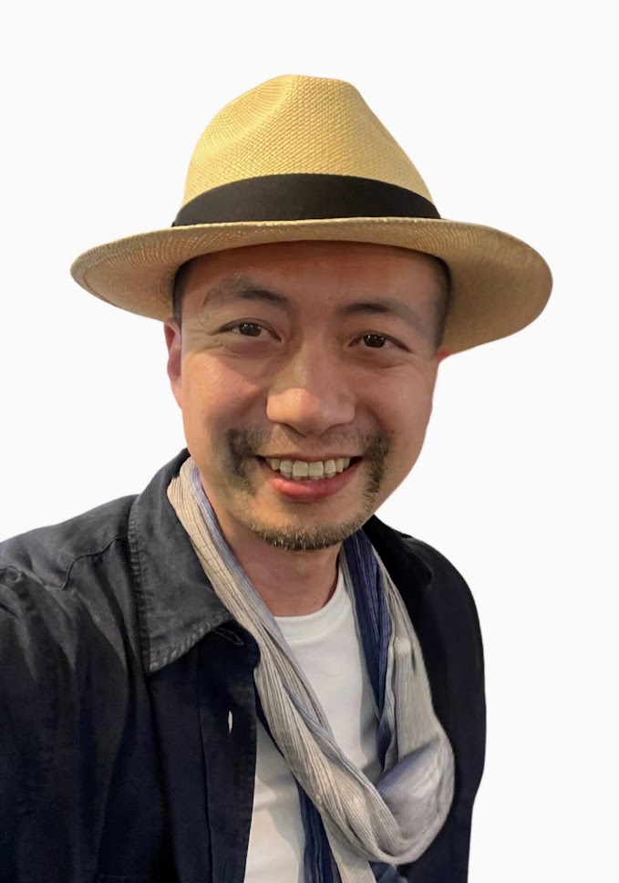 Gary Huang wearing a hat